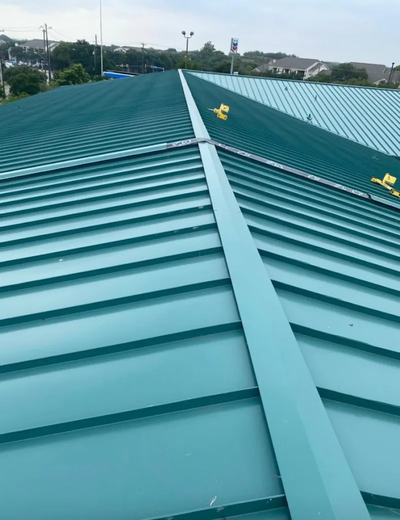 Green commercial metal roof ridge and valley for Metal Roof Repair in Smithville