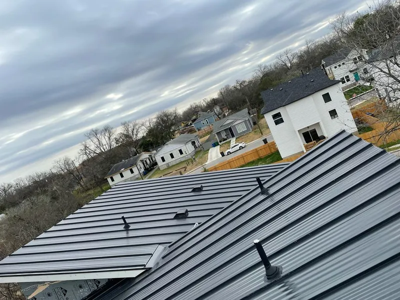 Standing seam metal roof panels with vents for Skylight Repair in Smithville